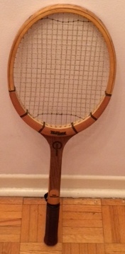 Light weight tennis racquet with press